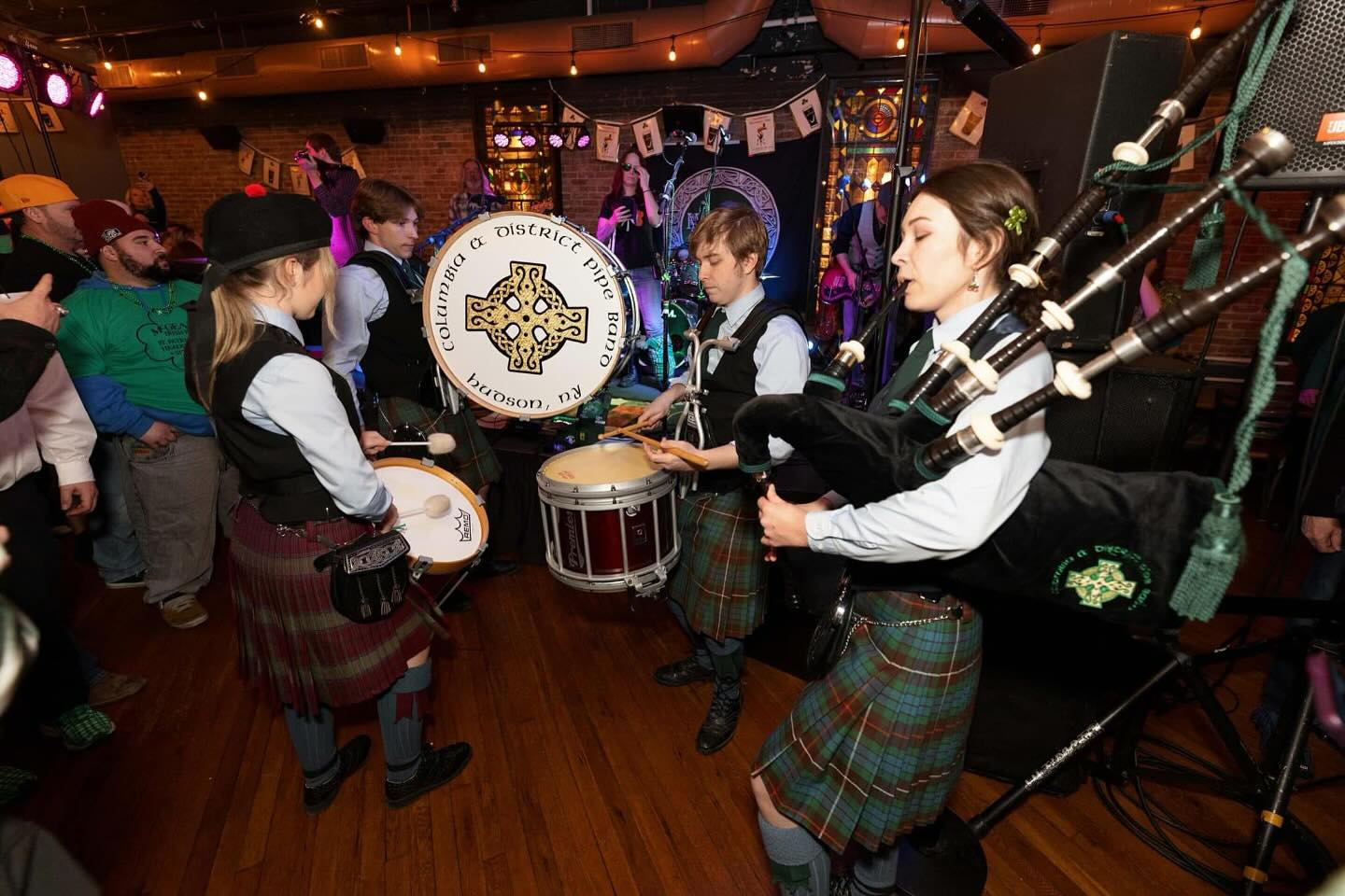 Highland bagpiper performing at an event